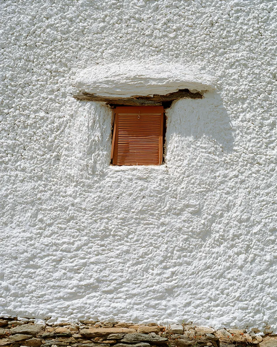 Whitewash goes on every spring, over the last coat, and over the coat before that.